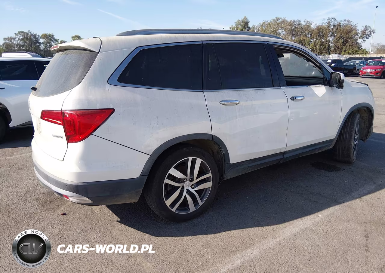 2016 Honda Pilot Touring VIN:5FNYF5H99GB051395 - 4