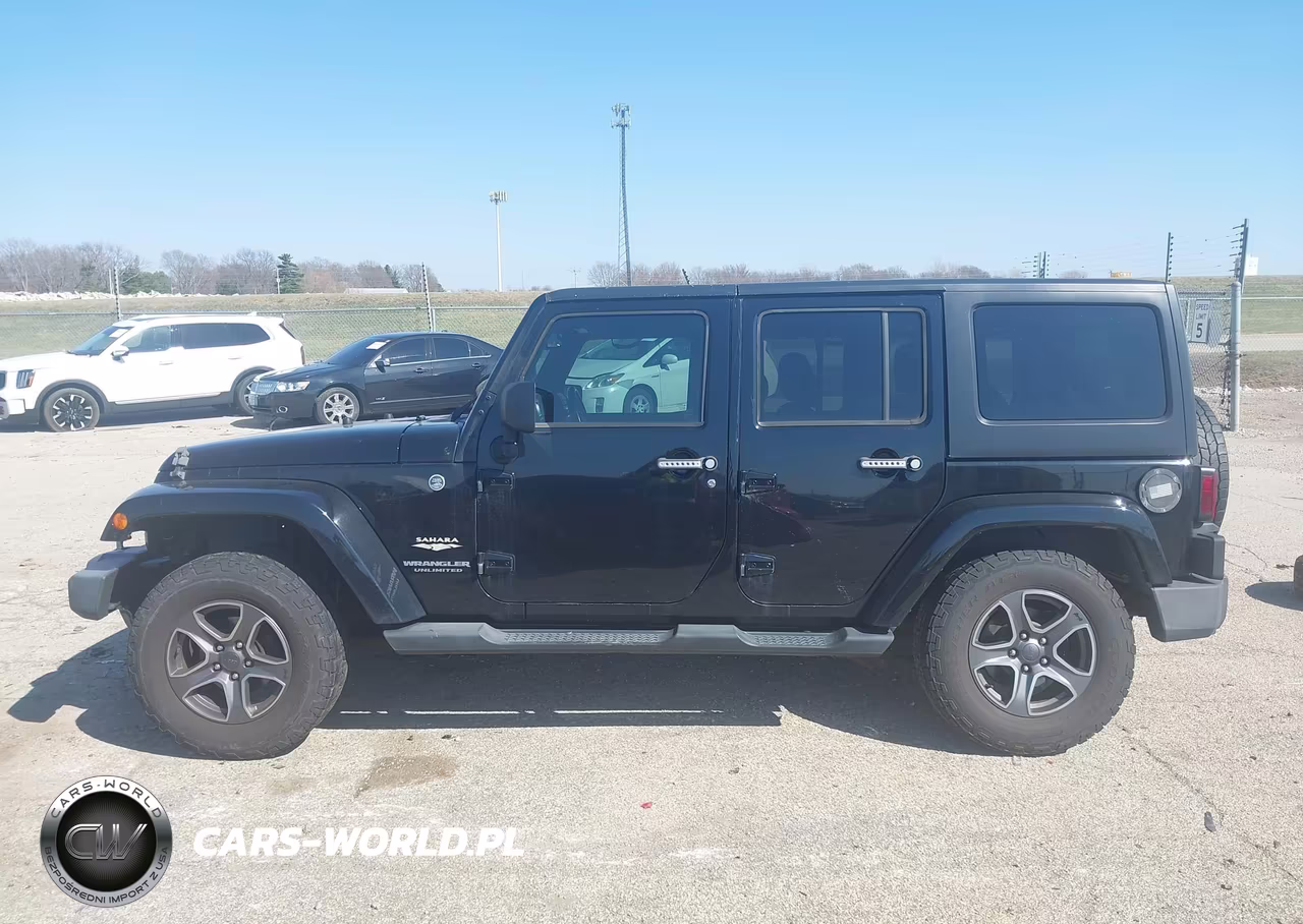 2013 Jeep Wrangler Unlimited Sahara VIN:1C4BJWEG0DL705075 - 14