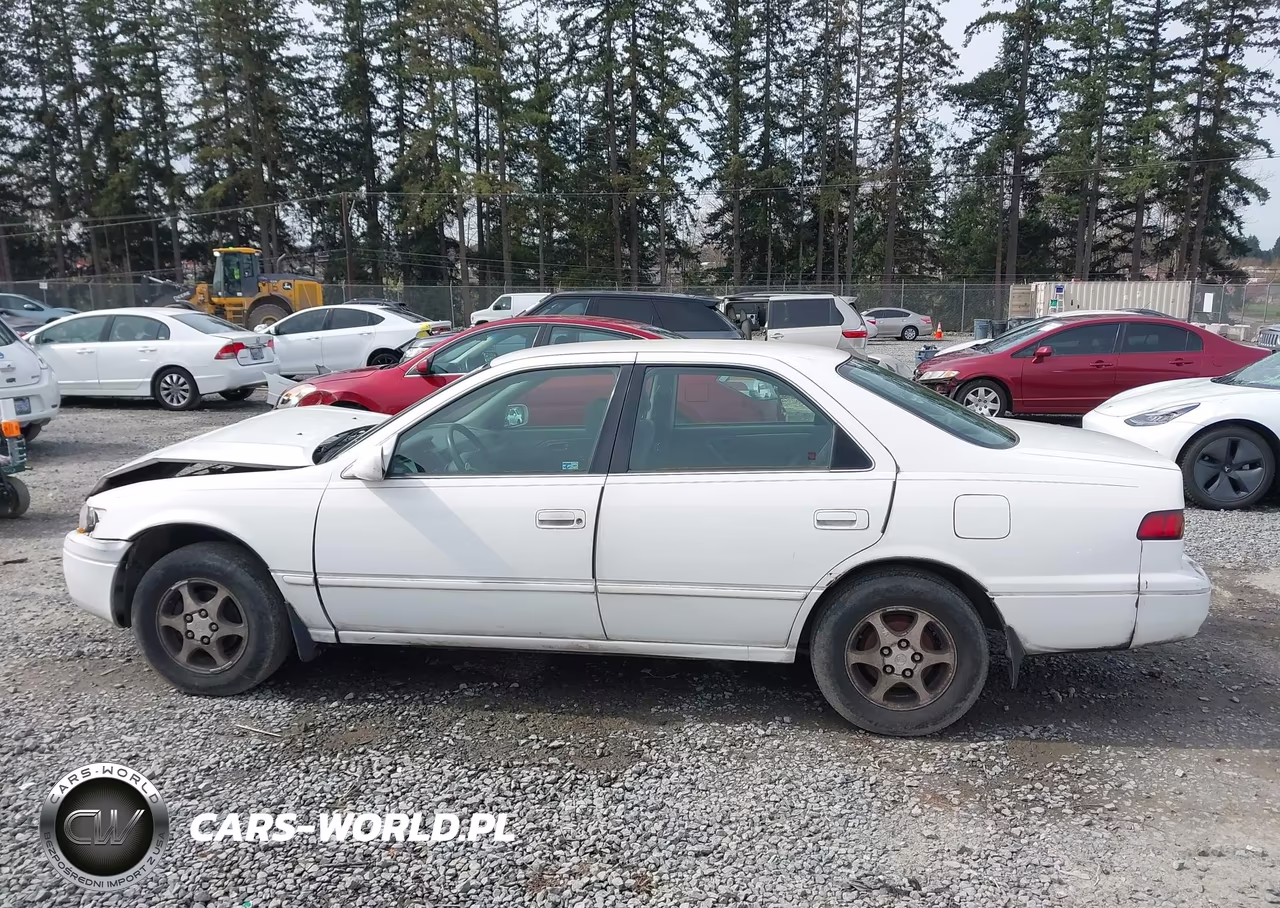 1999 Toyota Camry Le VIN:JT2BG22K9X0376990 - 14