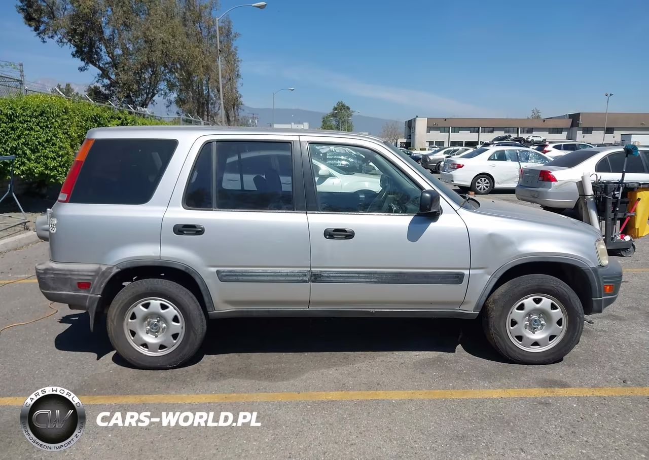 1999 Honda Cr-V Lx VIN:JHLRD2842XC023130 - 13