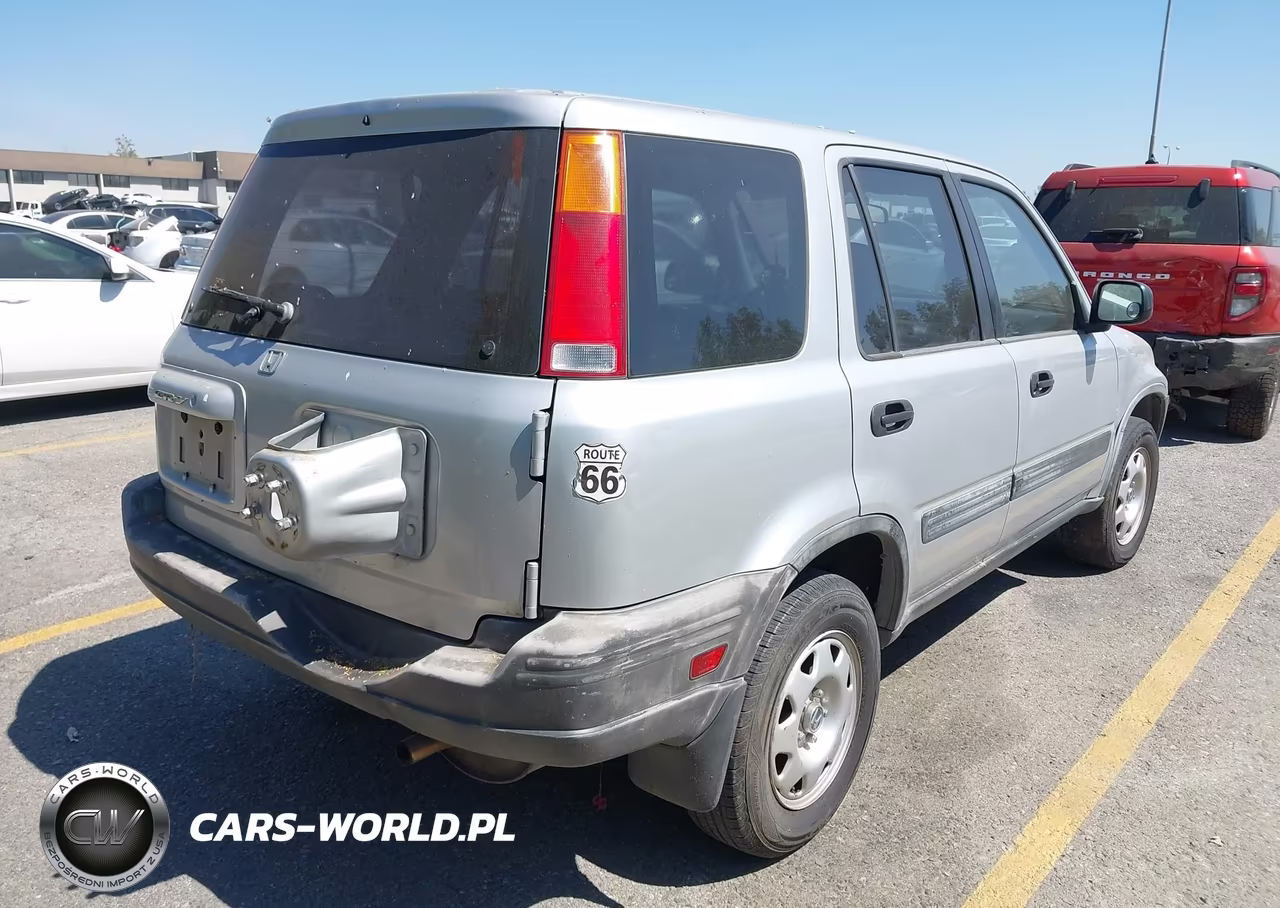 1999 Honda Cr-V Lx VIN:JHLRD2842XC023130 - 4