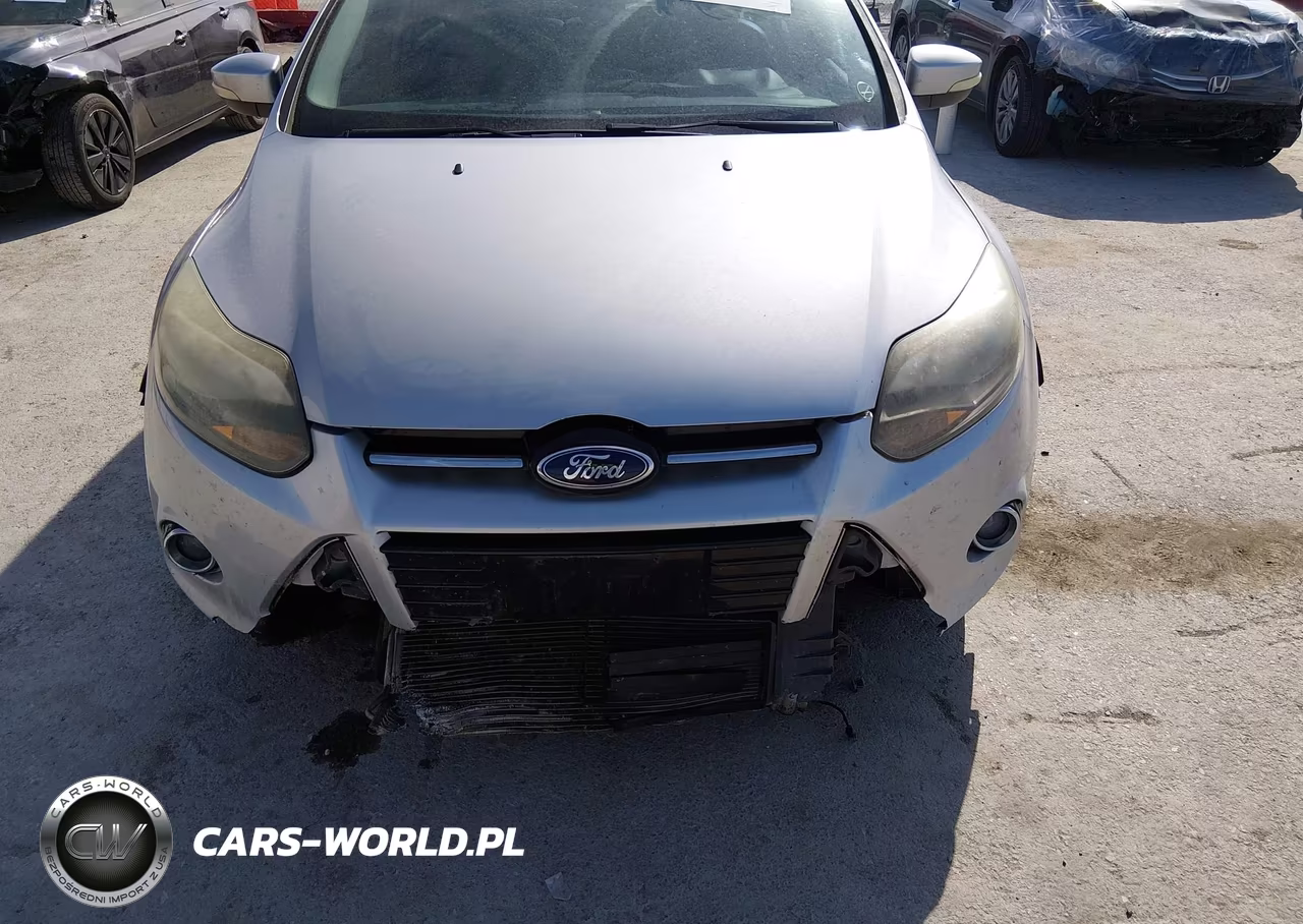 2012 Ford Focus Titanium VIN:1FAHP3N24CL479932 - 6