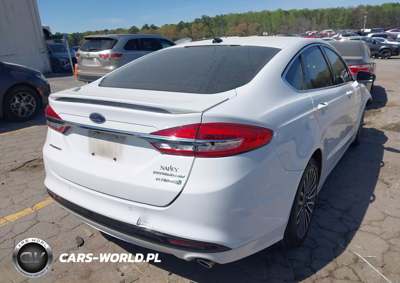 2018 Ford Fusion Hybrid Titanium VIN:3FA6P0RUXJR120424 - 4