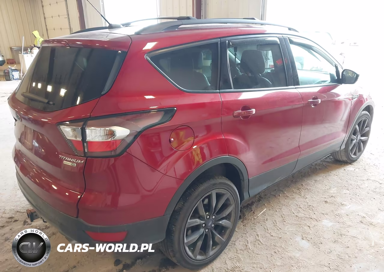 2017 Ford Escape Titanium VIN:1FMCU9J96HUD19129 - 4