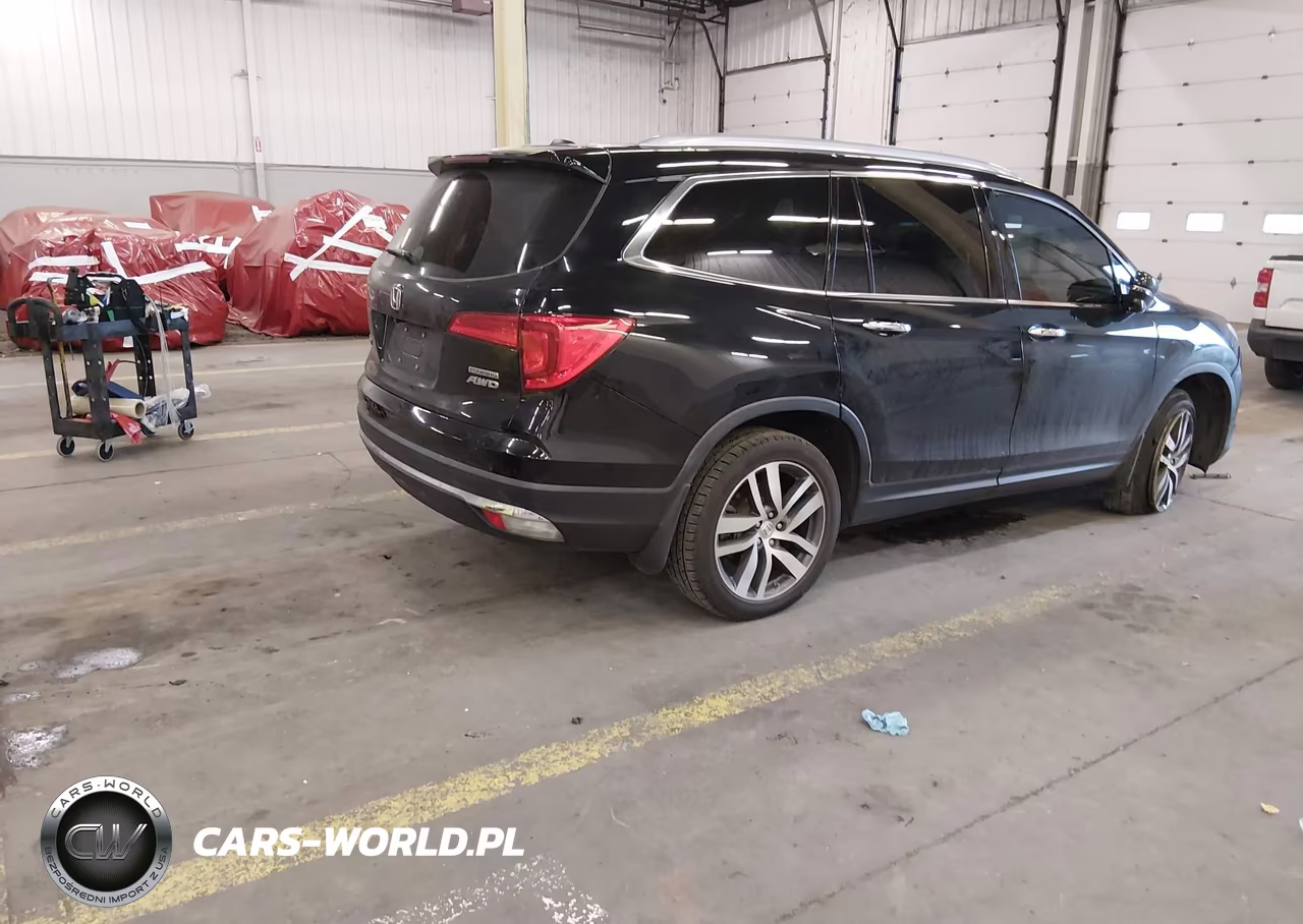2017 Honda Pilot Touring VIN:5FNYF6H91HB093793 - 4