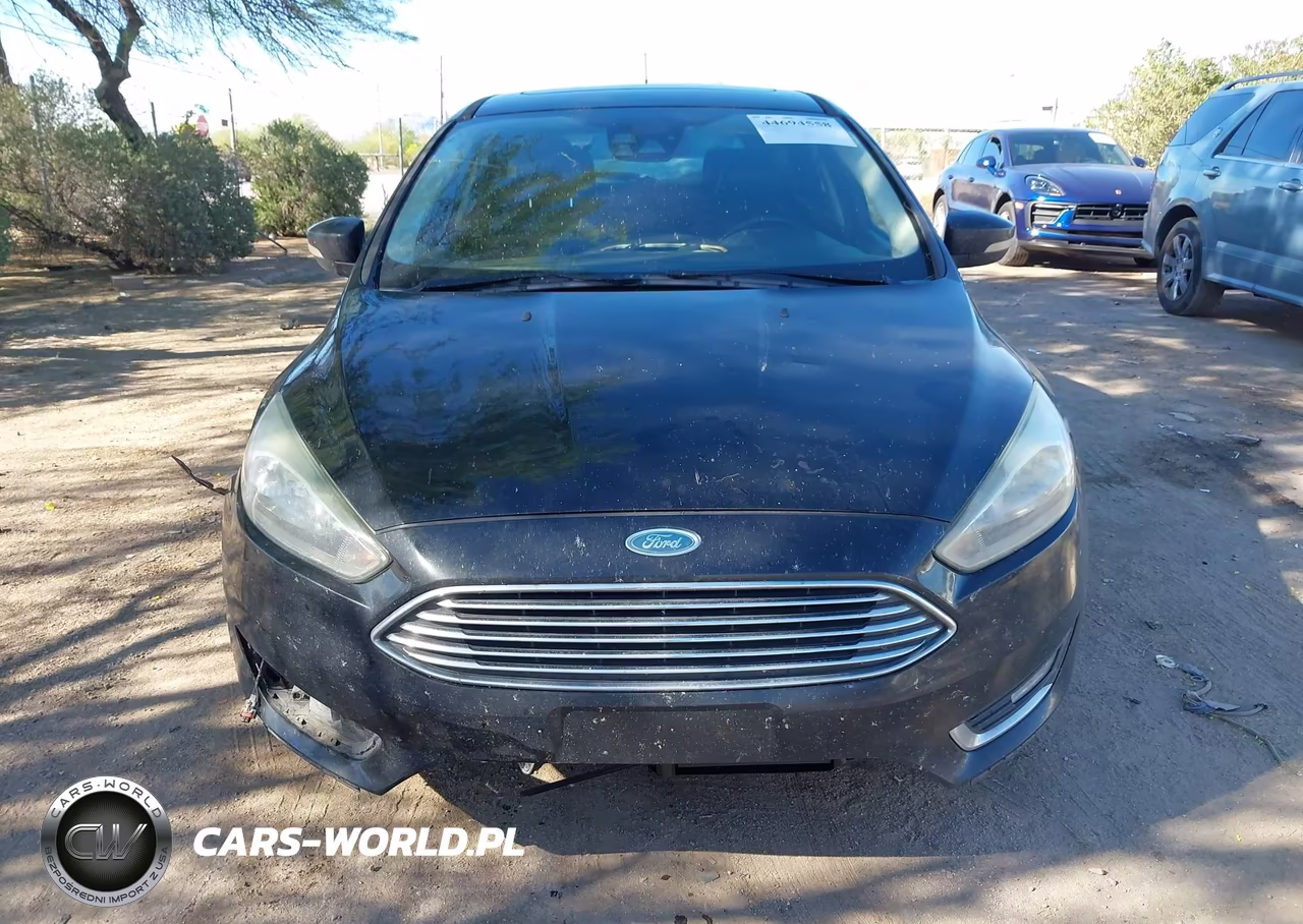 2016 Ford Focus Titanium VIN:1FADP3N22GL395919 - 13