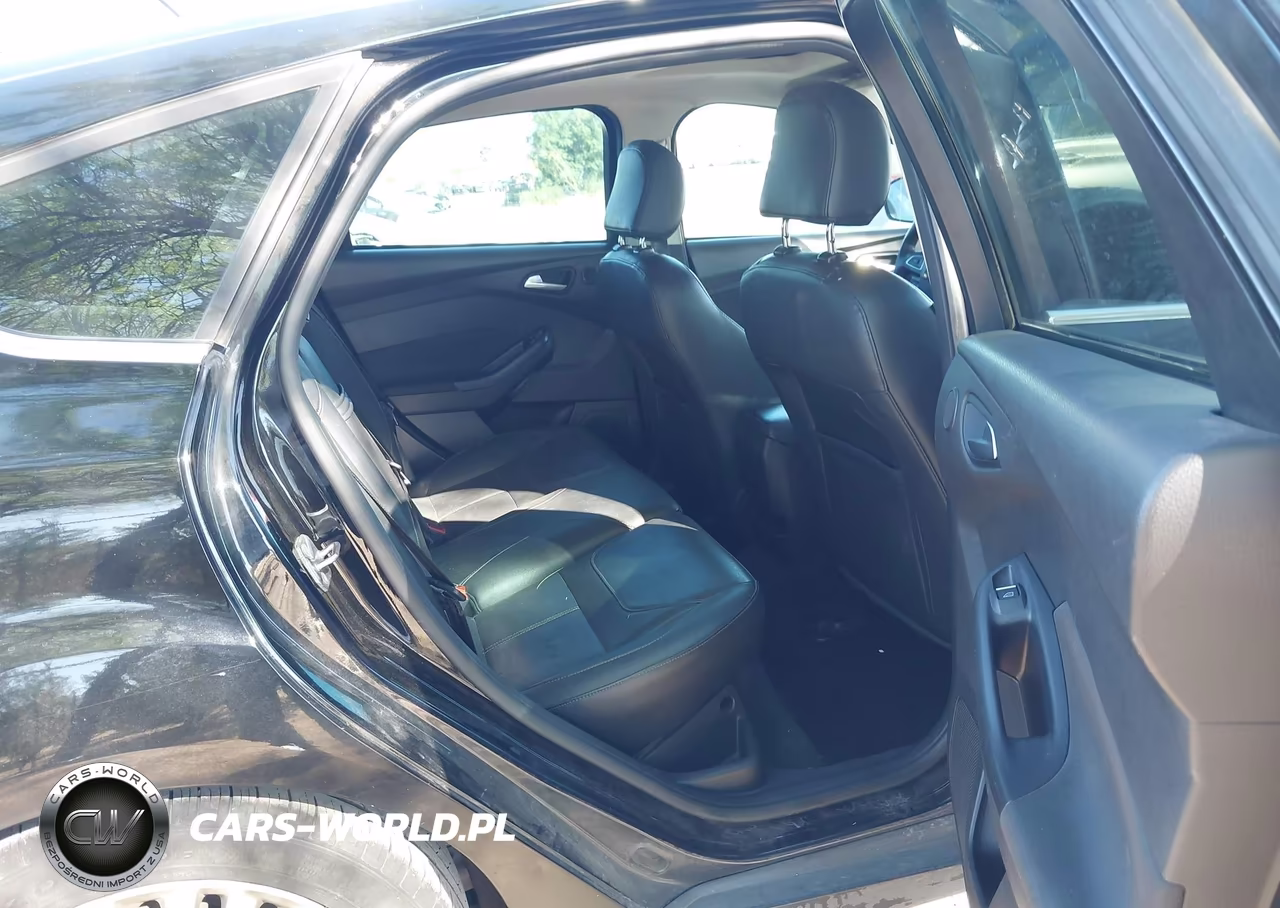 2016 Ford Focus Titanium VIN:1FADP3N22GL395919 - 8