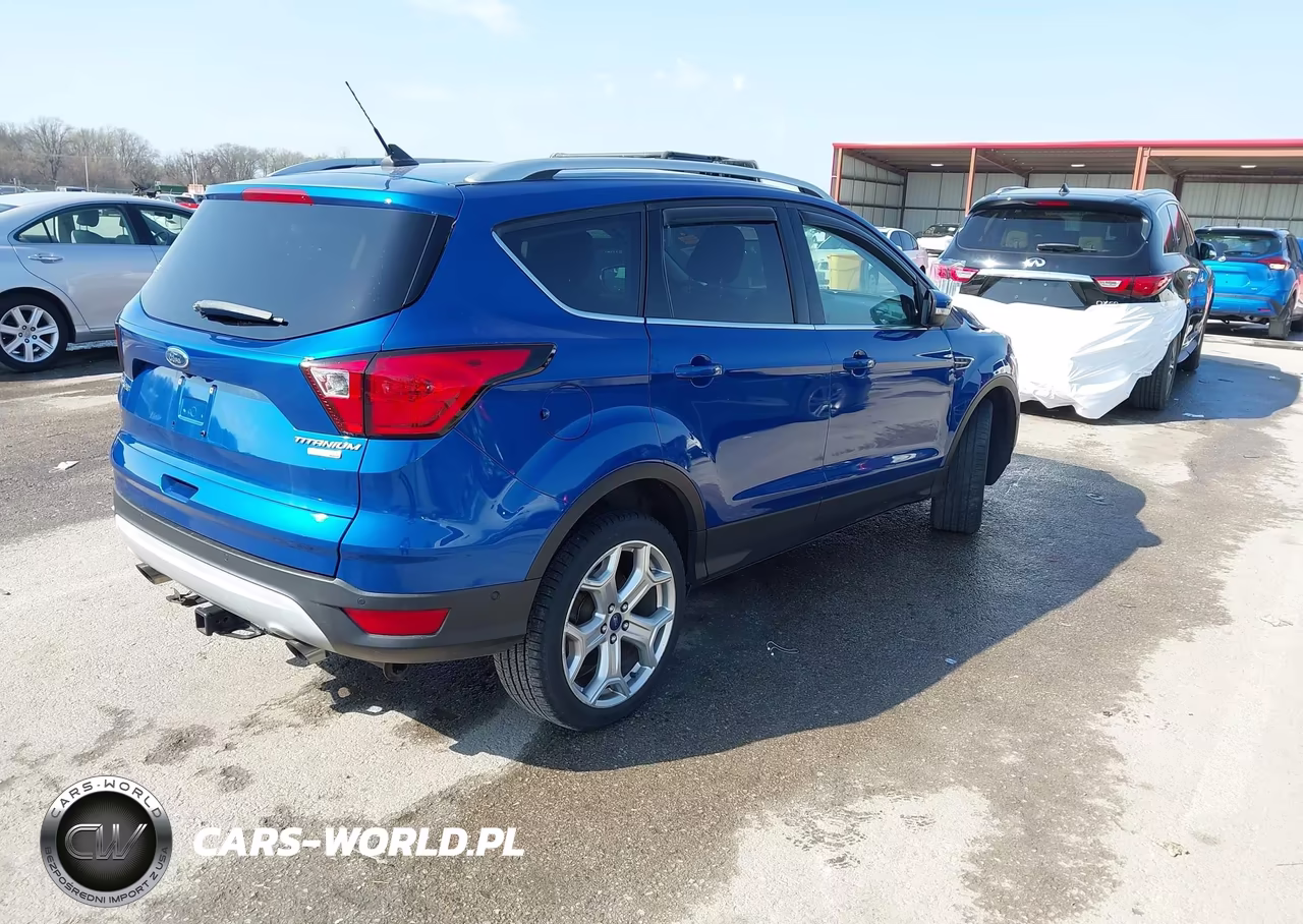 2019 Ford Escape Titanium VIN:1FMCU9J97KUC03610 - 4