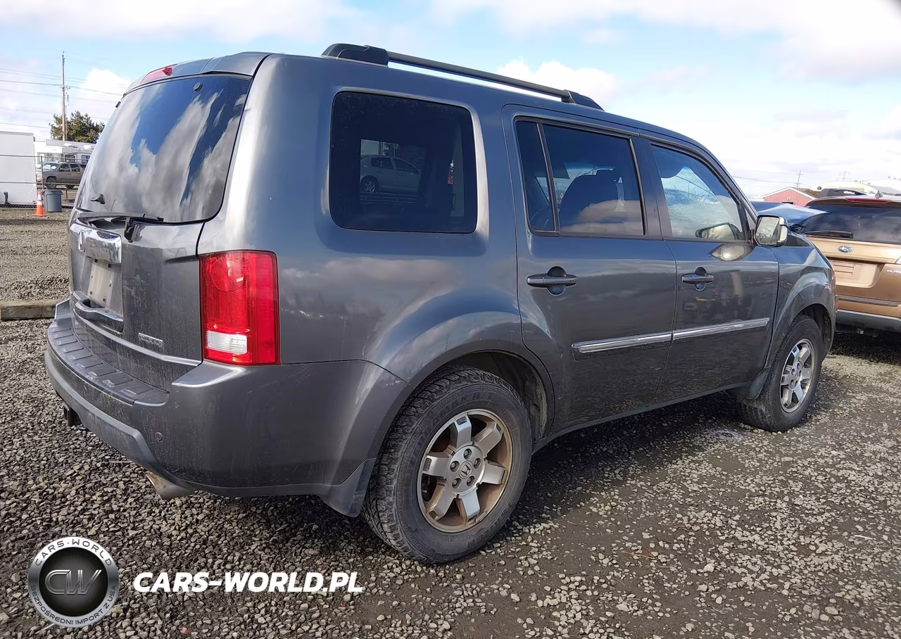 2011 Honda Pilot Touring VIN:5FNYF3H97BB055183 - 4