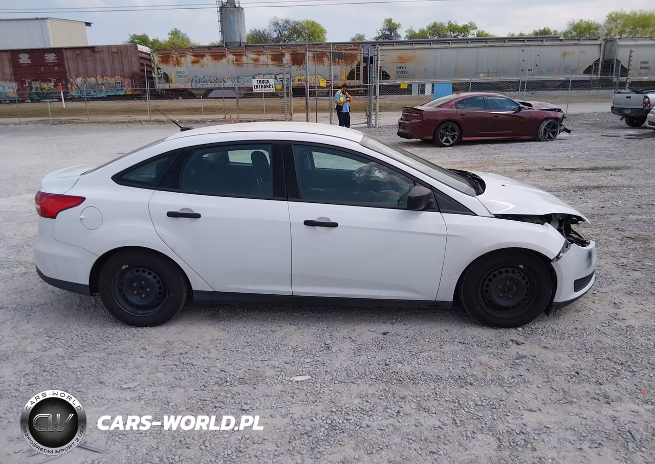 2016 Ford Focus S VIN:1FADP3E23GL399591 - 14