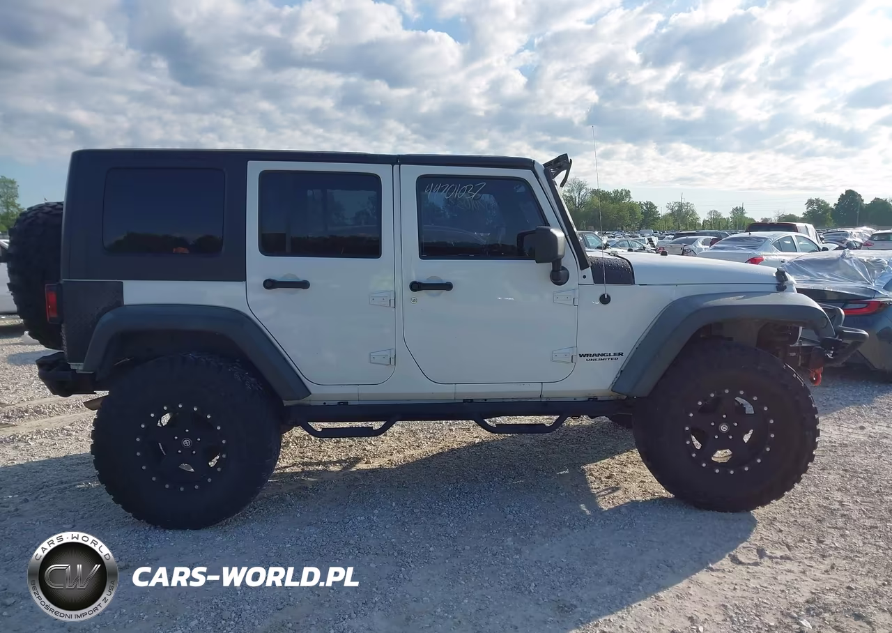2012 Jeep Wrangler Unlimited Sport VIN:1C4HJWDG7CL140799 - 13
