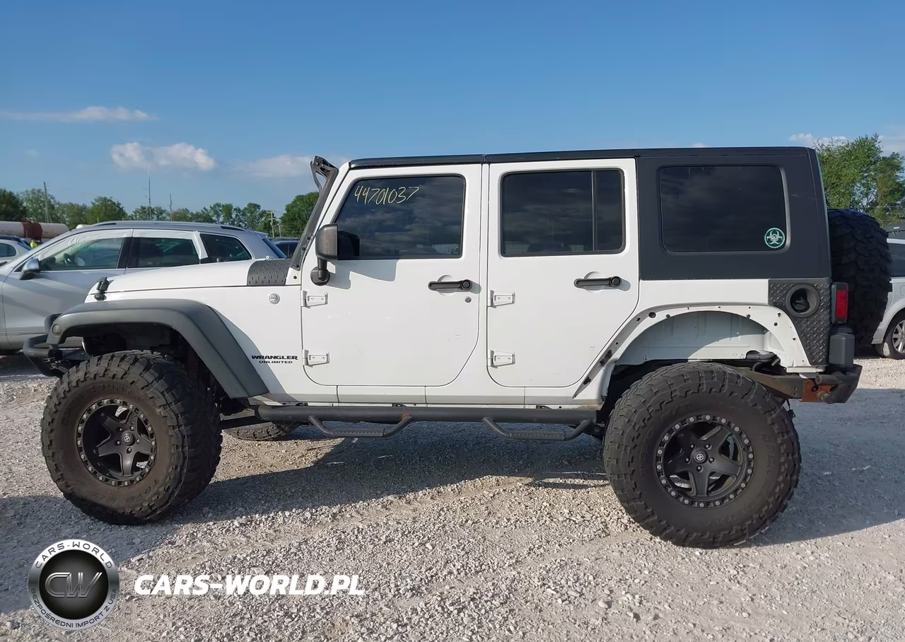 2012 Jeep Wrangler Unlimited Sport VIN:1C4HJWDG7CL140799 - 14