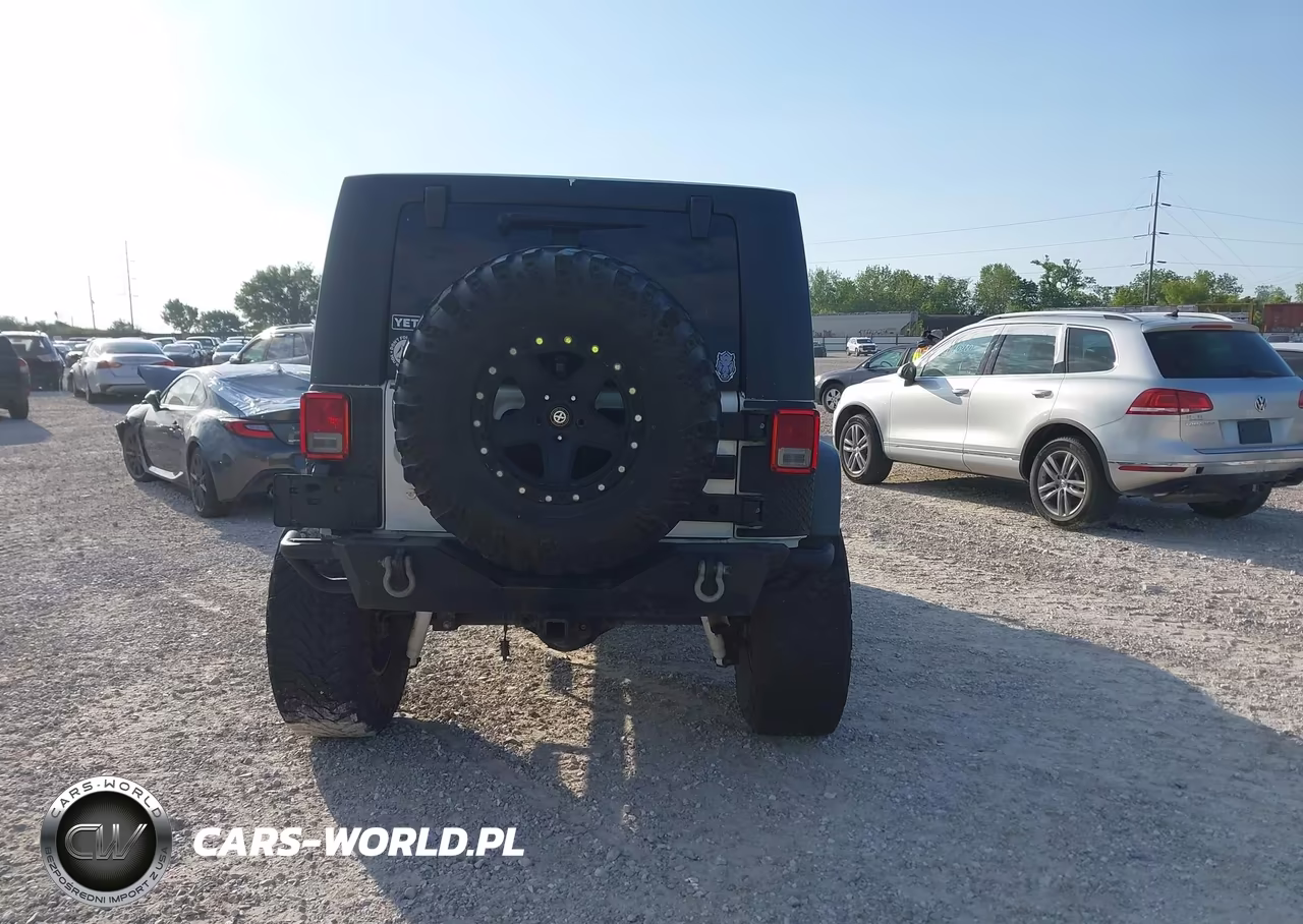 2012 Jeep Wrangler Unlimited Sport VIN:1C4HJWDG7CL140799 - 16