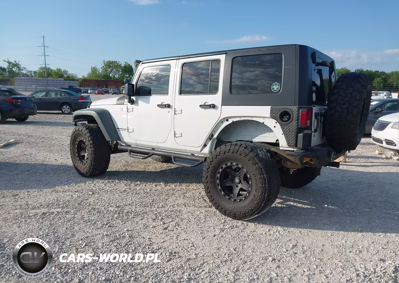 2012 Jeep Wrangler Unlimited Sport VIN:1C4HJWDG7CL140799 - 3