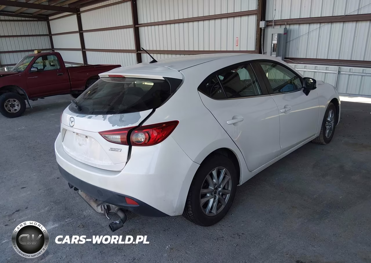 2015 Mazda Mazda3 I Touring VIN:JM1BM1L77F1258479 - 4