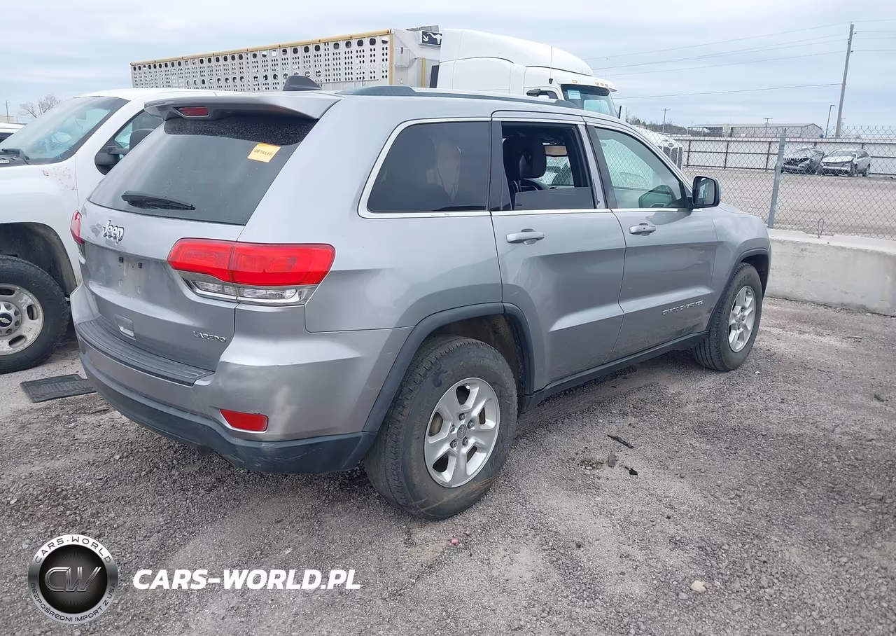 2015 Jeep Grand Cherokee Laredo VIN:1C4RJEAG9FC728338 - 4