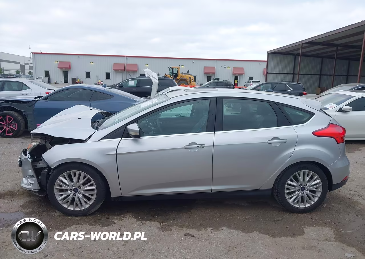 2017 Ford Focus Titanium VIN:1FADP3N21HL268239 - 14