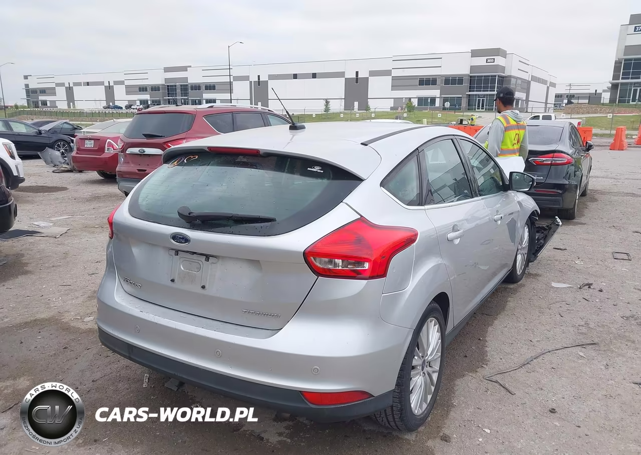 2017 Ford Focus Titanium VIN:1FADP3N21HL268239 - 4