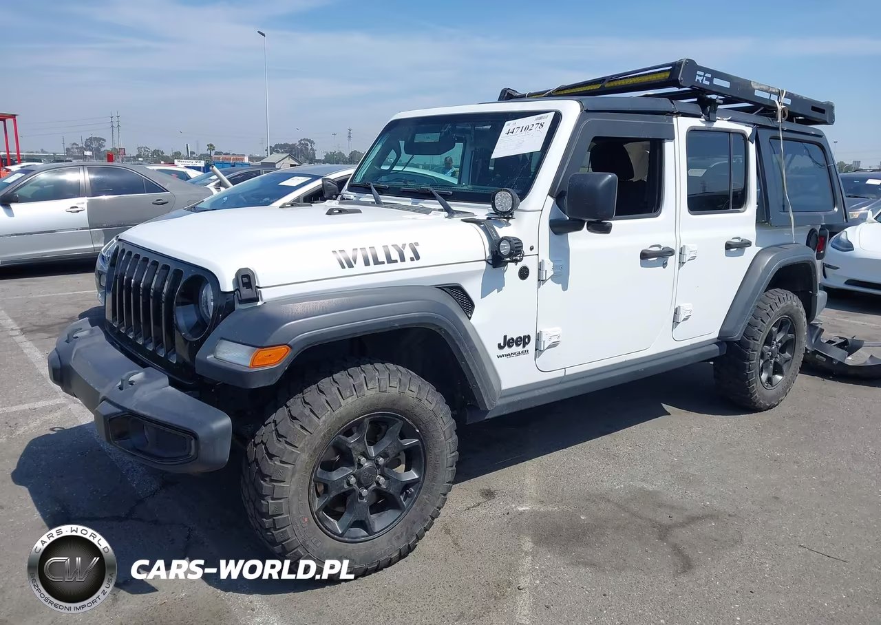 2021 Jeep Wrangler Unlimited Willys Sport 4X4 VIN:1C4HJXDG3MW825212 - 14