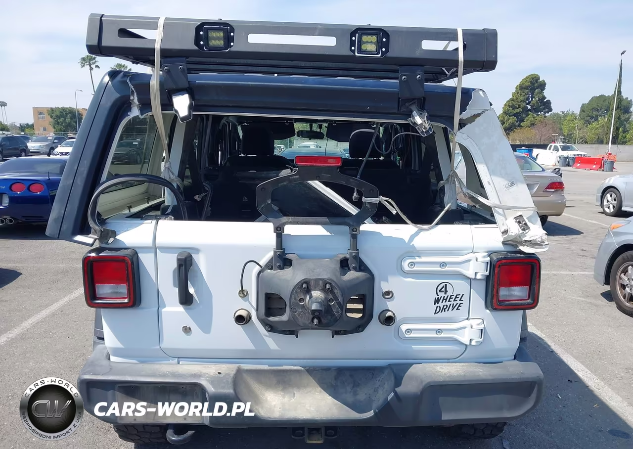 2021 Jeep Wrangler Unlimited Willys Sport 4X4 VIN:1C4HJXDG3MW825212 - 16