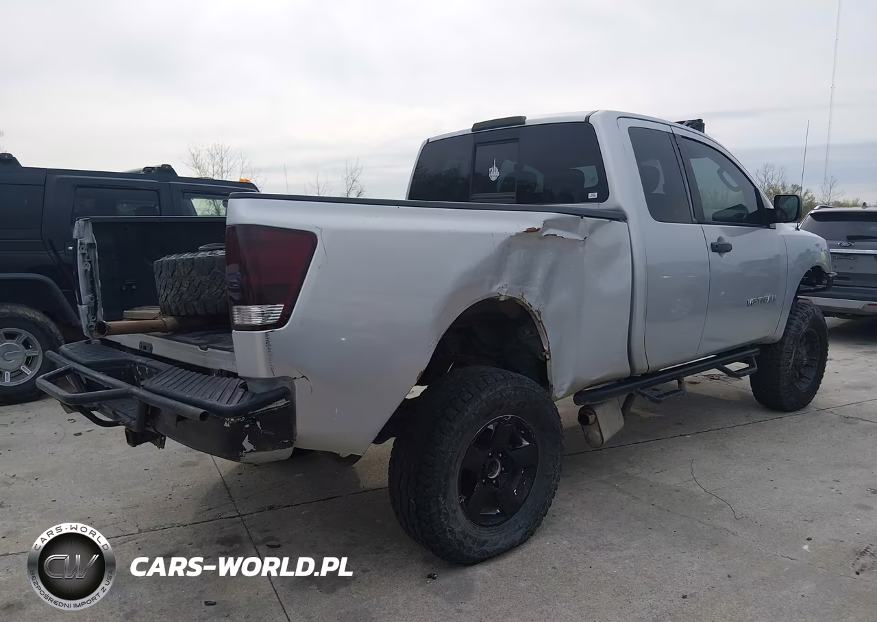 2010 Nissan Titan Xe VIN:1N6BA0CJ4AN309109 - 4
