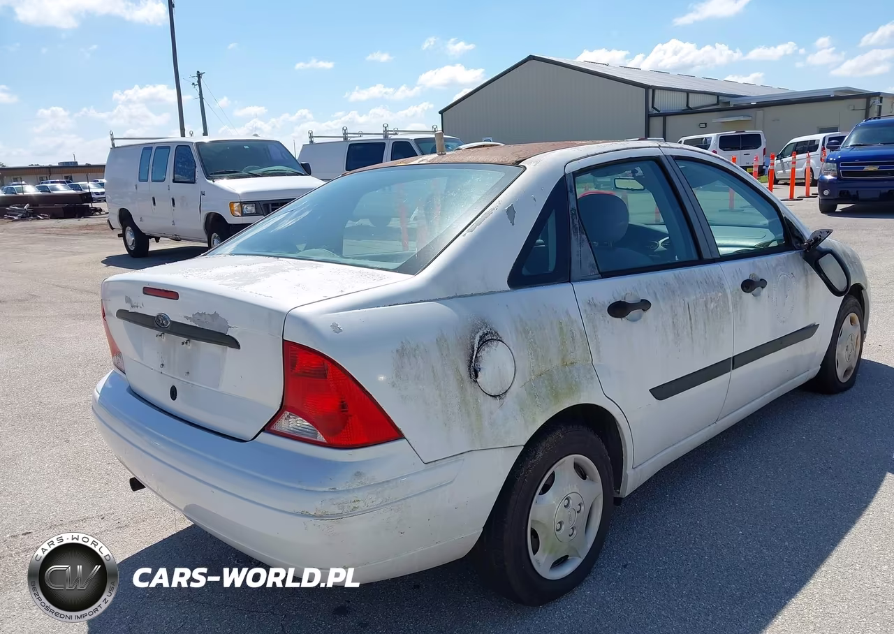 2001 Ford Focus Lx VIN:1FAFP33P01W123978 - 4