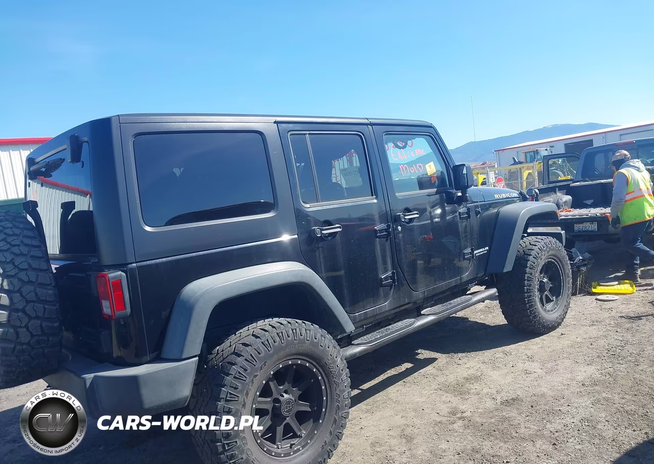 2014 Jeep Wrangler Unlimited Rubicon VIN:1C4BJWFG0EL296611 - 4