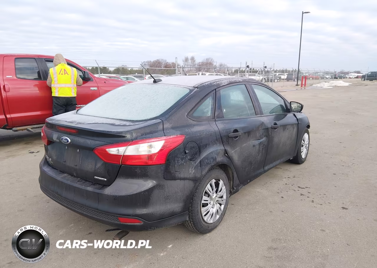 2014 Ford Focus S VIN:1FADP3E22EL219014 - 4