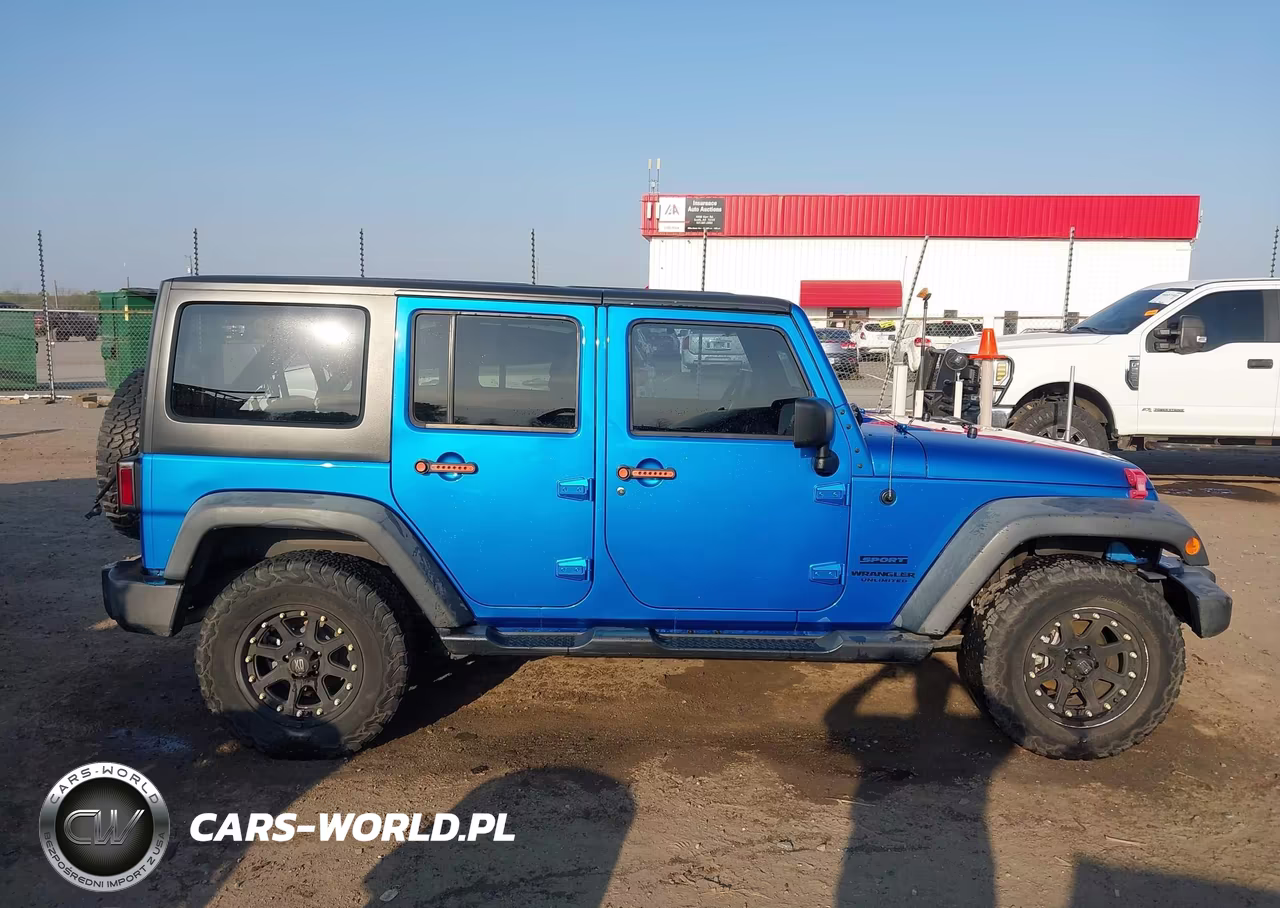 2015 Jeep Wrangler Unlimited Sport VIN:1C4HJWDGXFL550873 - 14
