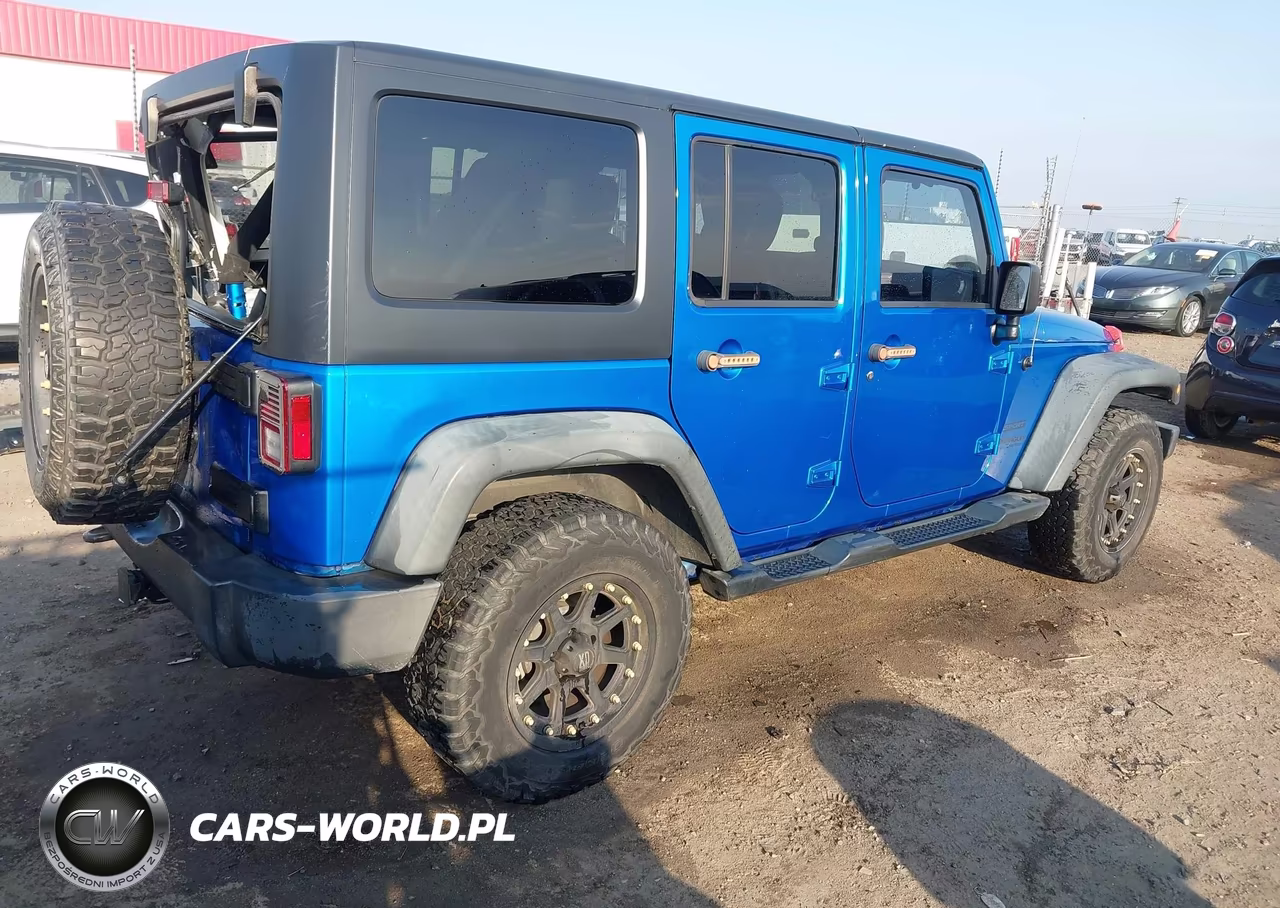 2015 Jeep Wrangler Unlimited Sport VIN:1C4HJWDGXFL550873 - 4