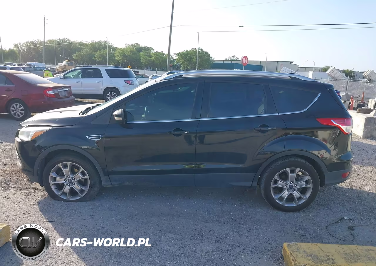 2016 Ford Escape Titanium VIN:1FMCU0JXXGUA60749 - 14