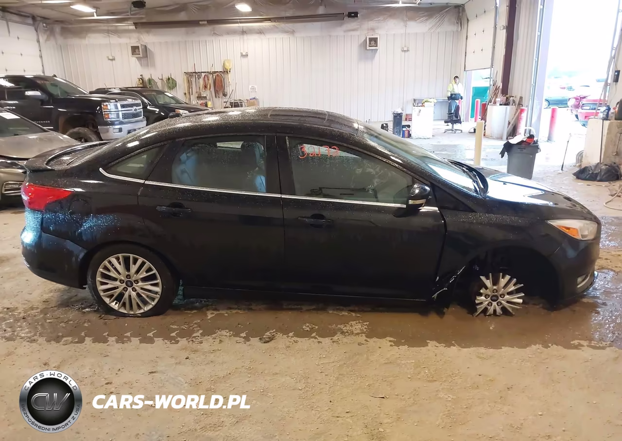 2017 Ford Focus Titanium VIN:1FADP3J26HL291358 - 13