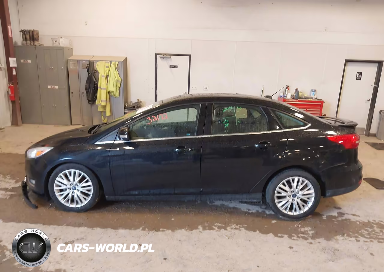2017 Ford Focus Titanium VIN:1FADP3J26HL291358 - 14