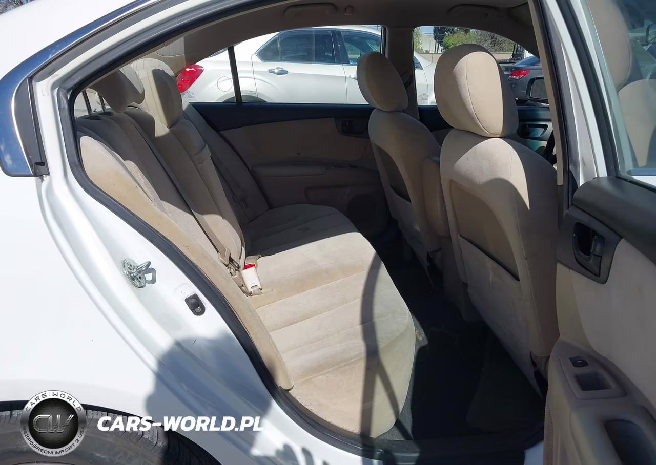 2009 Kia Optima Lx VIN:KNAGE228995333356 - 8