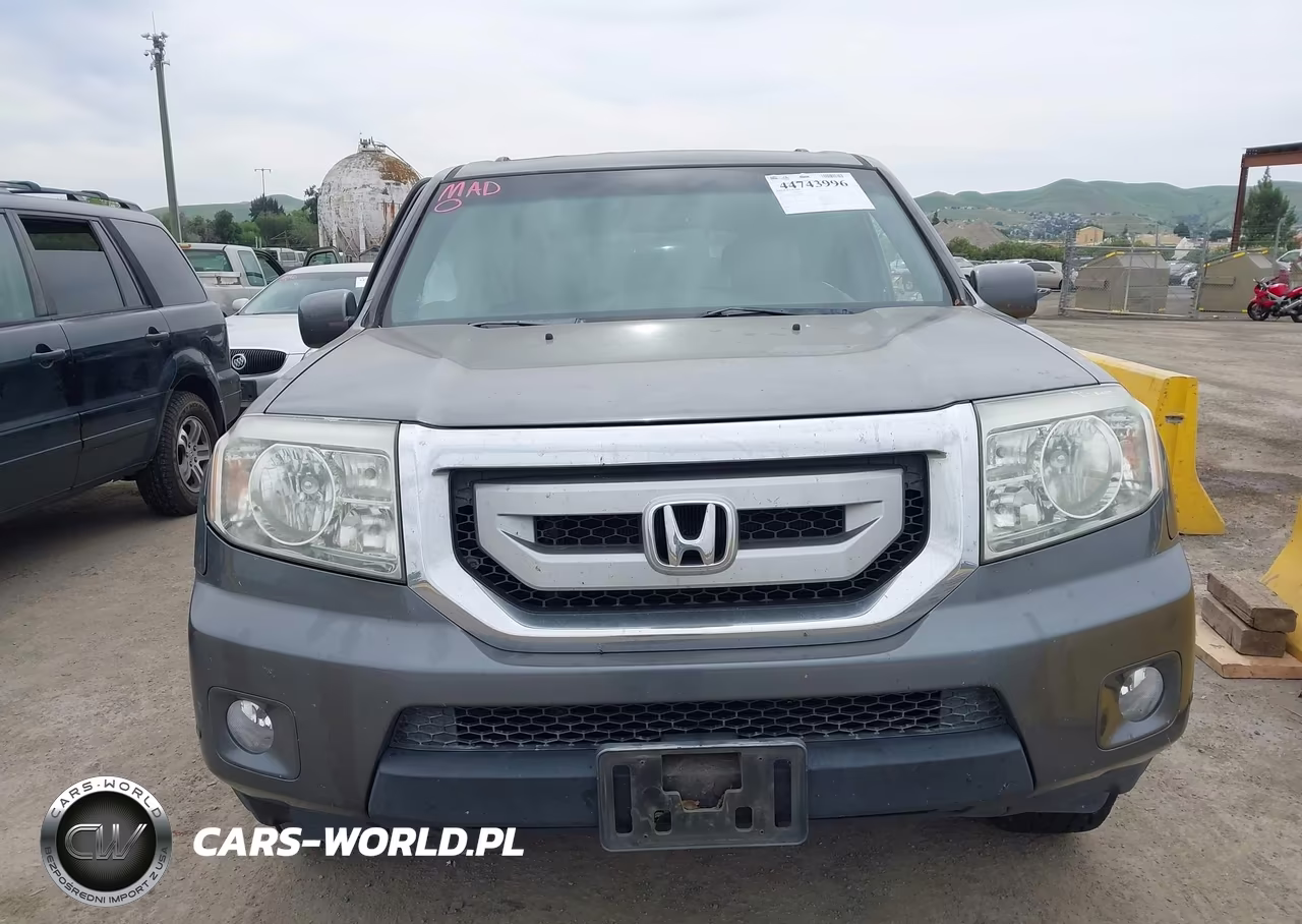 2011 Honda Pilot Touring VIN:5FNYF4H95BB090634 - 12