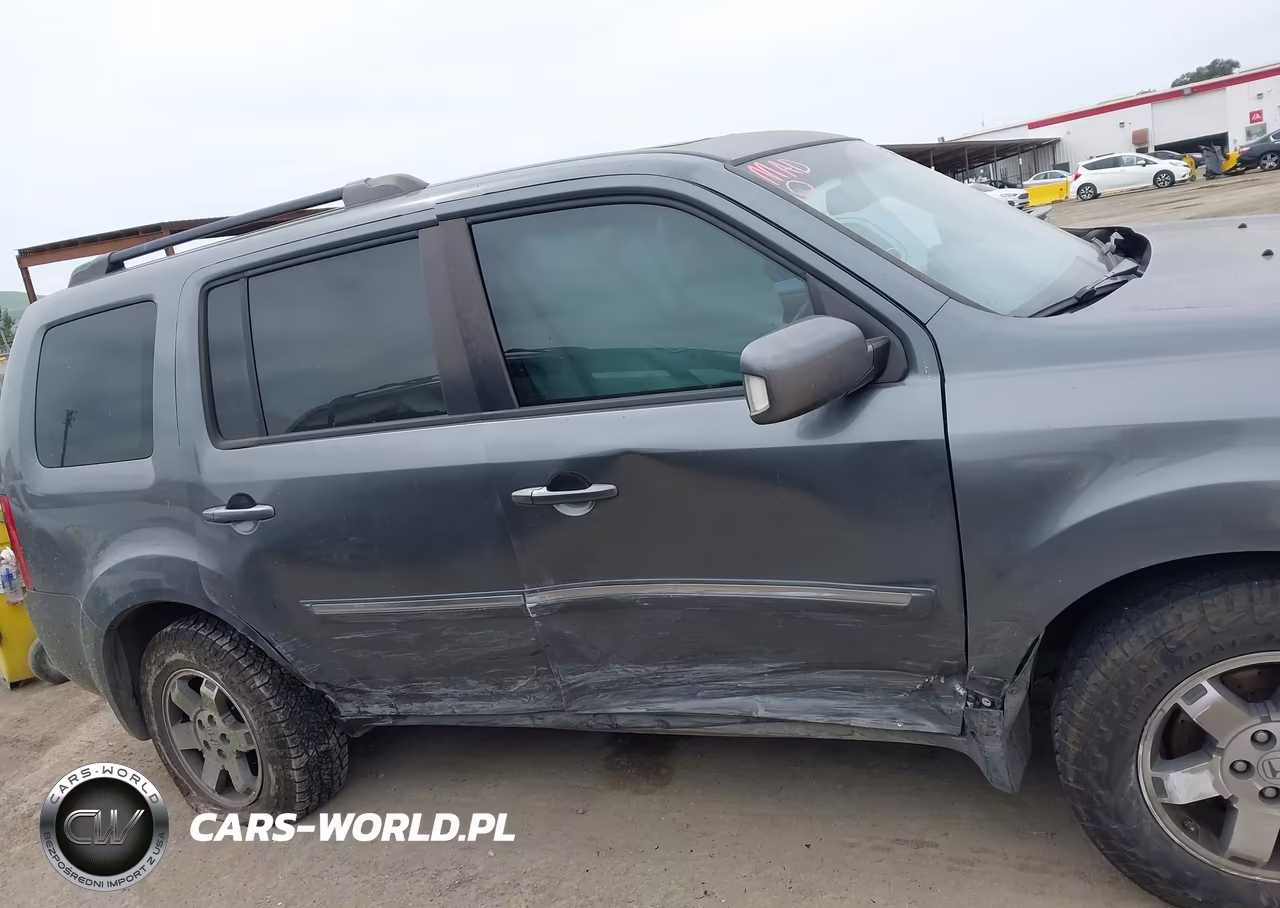 2011 Honda Pilot Touring VIN:5FNYF4H95BB090634 - 13