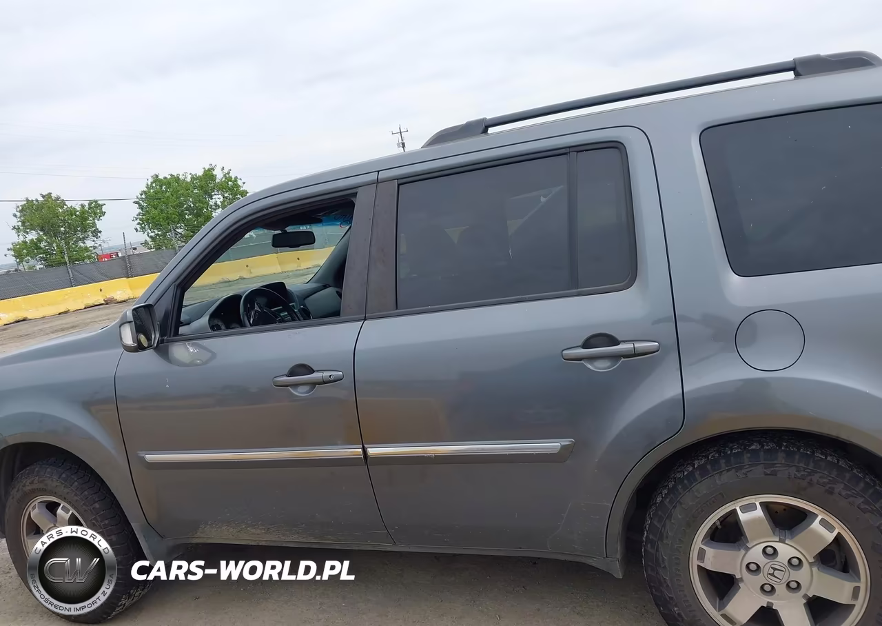 2011 Honda Pilot Touring VIN:5FNYF4H95BB090634 - 14