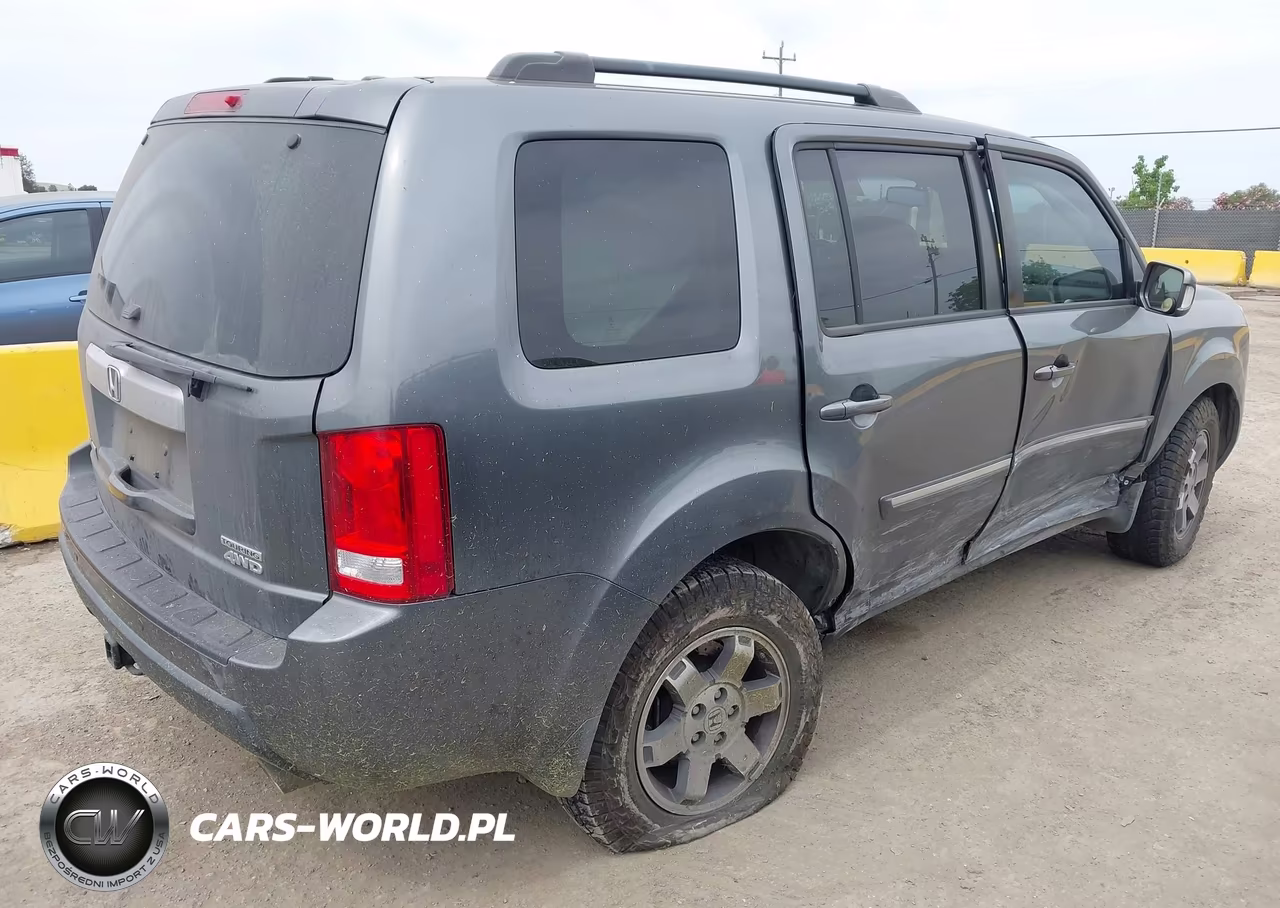 2011 Honda Pilot Touring VIN:5FNYF4H95BB090634 - 4