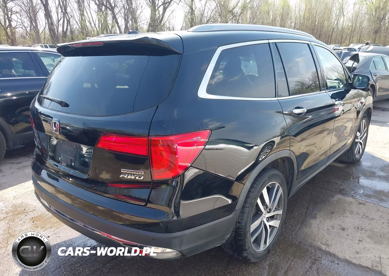 2017 Honda Pilot Touring VIN:5FNYF6H97HB073841 - 4