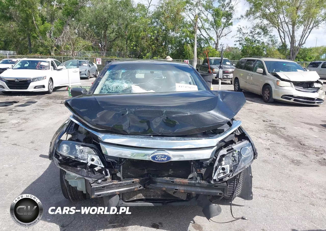 2011 Ford Fusion S VIN:3FAHP0GA8BR302027 - 13