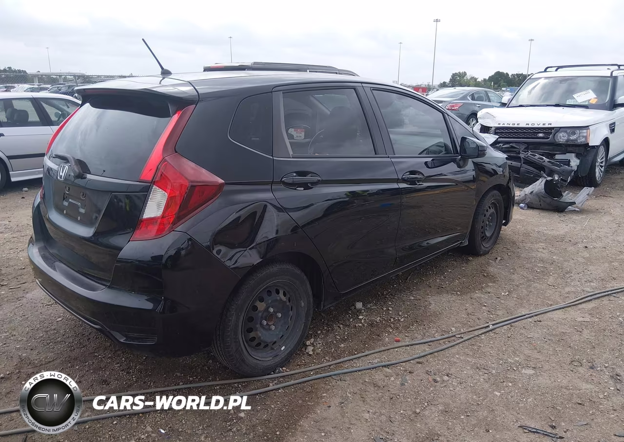 2018 Honda Fit Lx VIN:3HGGK5H42JM735379 - 4