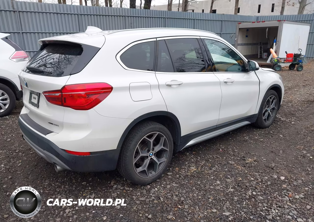 2018 BMW X1 xDrive28I VIN:WBXHT3C31J5L31338 - 4