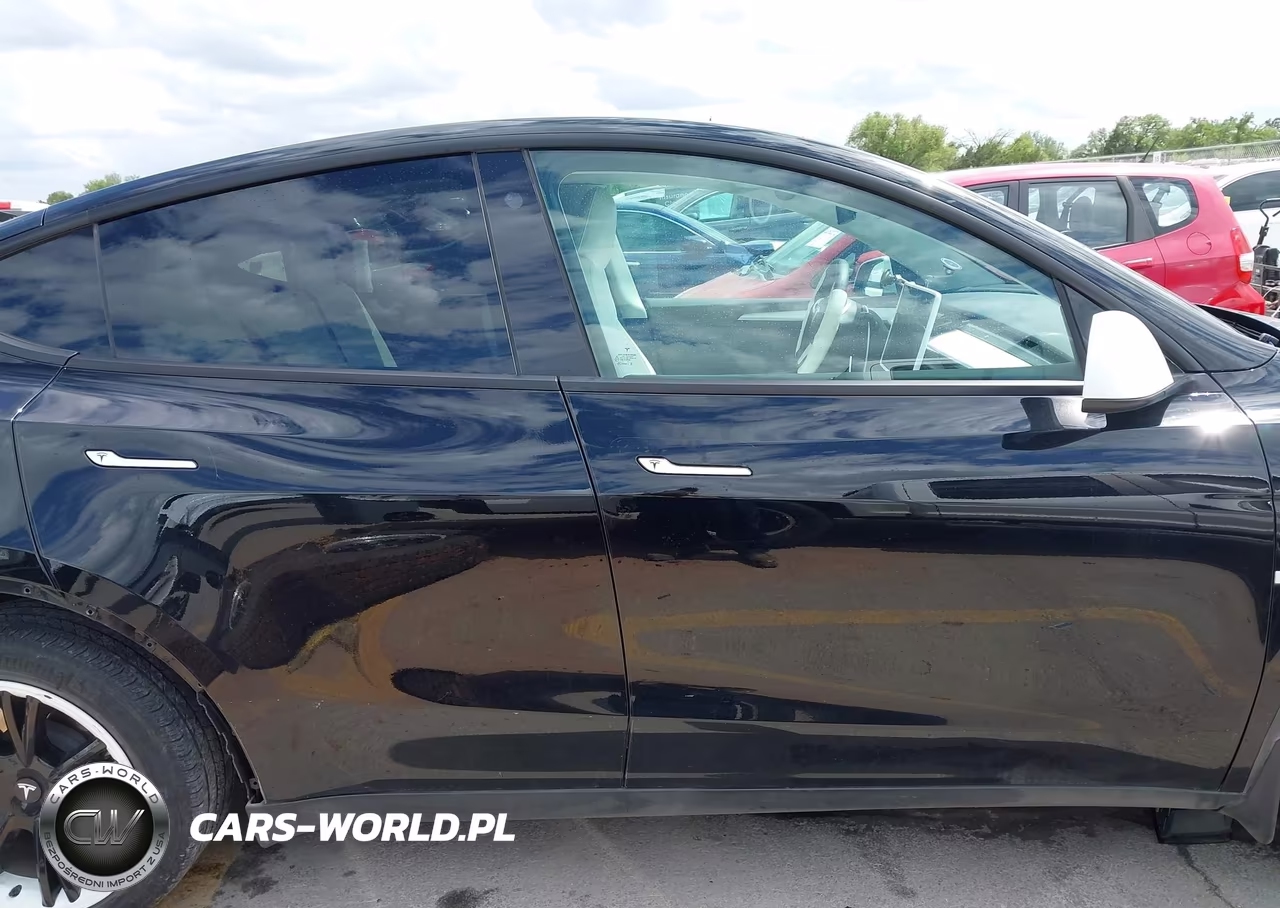 2023 Tesla Model Y VIN:7SAYGAEE4PF646522 - 13