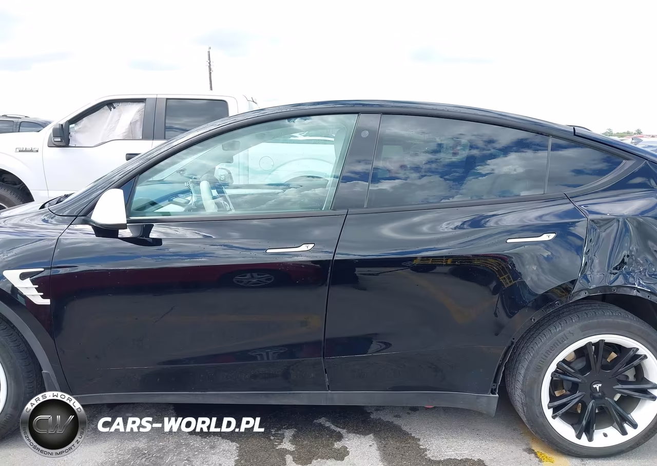 2023 Tesla Model Y VIN:7SAYGAEE4PF646522 - 14