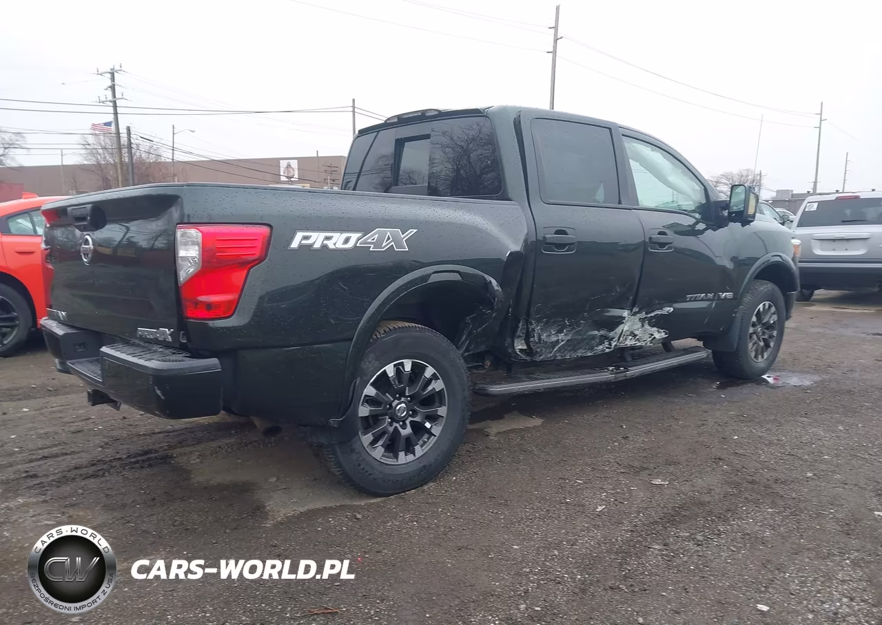 2019 Nissan Titan Pro-4X VIN:1N6AA1E58KN503290 - 4