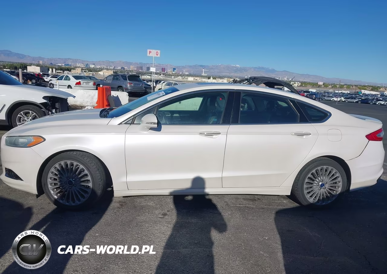 2016 Ford Fusion Titanium VIN:3FA6P0K90GR263381 - 14
