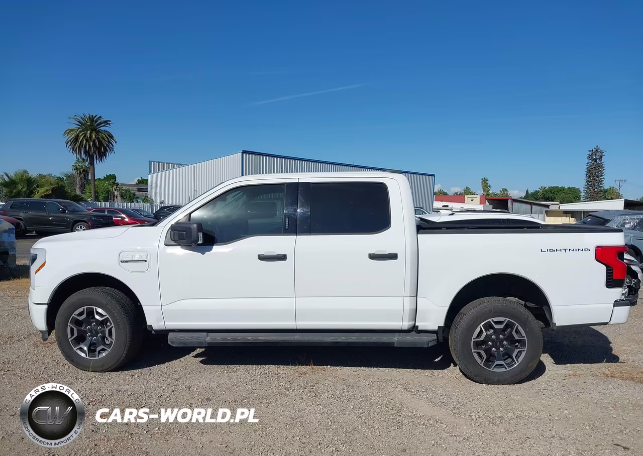 2022 Ford F-150 Lightning Xlt VIN:1FTVW1ELXNWG12806 - 14