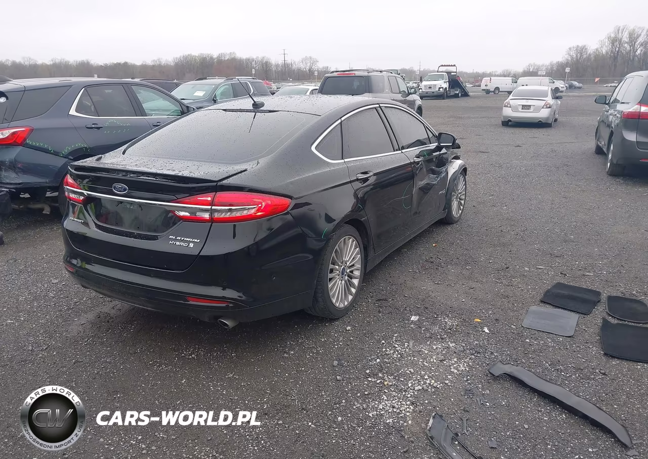 2018 Ford Fusion Hybrid Platinum VIN:3FA6P0RU9JR154211 - 4