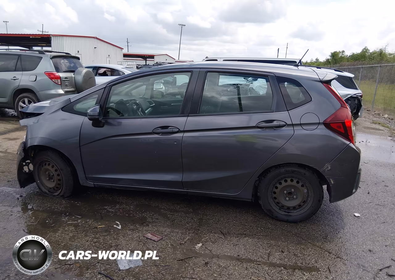 2015 Honda Fit Lx VIN:3HGGK5G55FM740867 - 14
