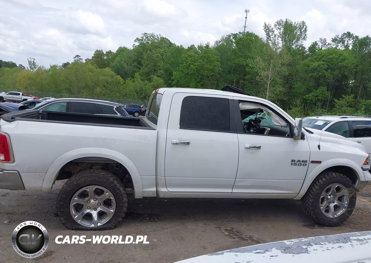 2015 Ram 1500 Laramie VIN:1C6RR7NM9FS594447 - 14